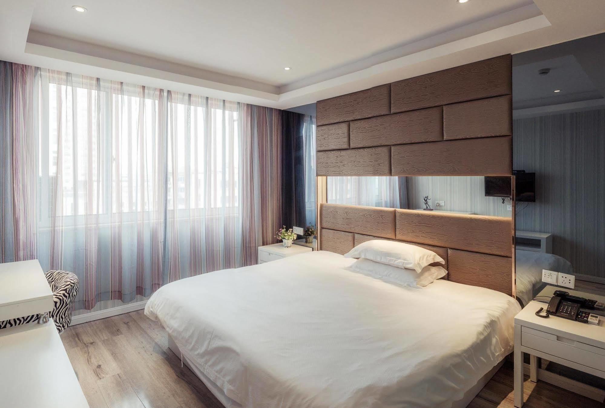 Milan Fashion Hotel Deqing Esterno foto