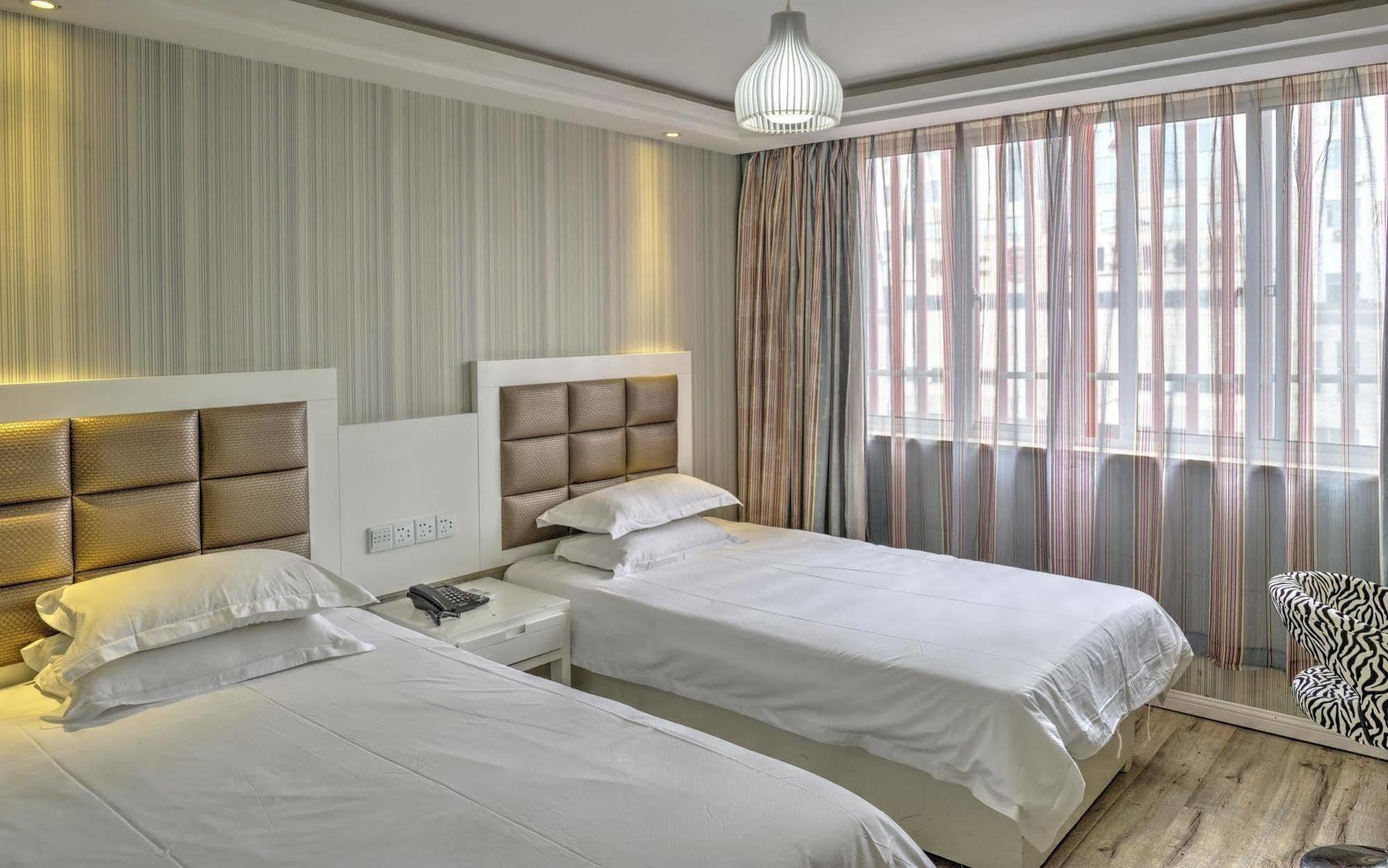 Milan Fashion Hotel Deqing Esterno foto