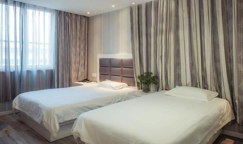 Milan Fashion Hotel Deqing Esterno foto